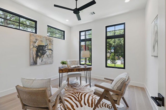office area featuring ceiling fan, recessed lighting, light wood finished floors, and baseboards