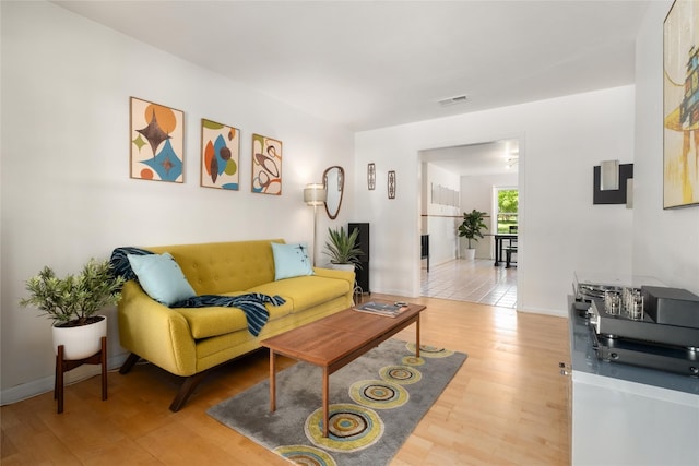 4819 Roundup Trl, Austin, TX 78745 - living room featuring wood finished floors and baseboards