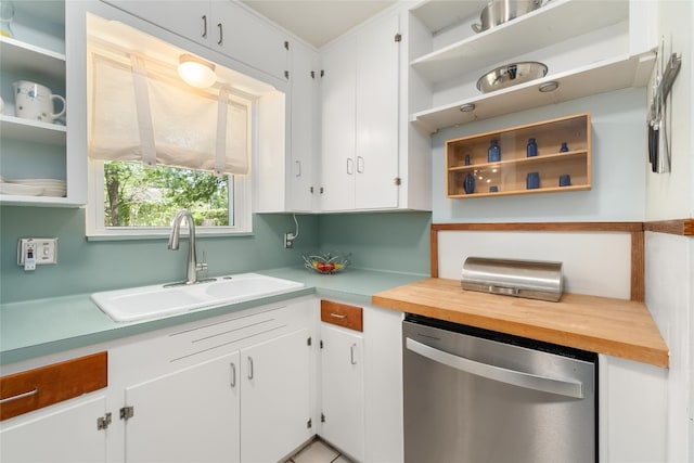 4819 Roundup Trl, Austin, TX 78745 - kitchen featuring dishwasher, a sink, open shelves, and white cabinetry