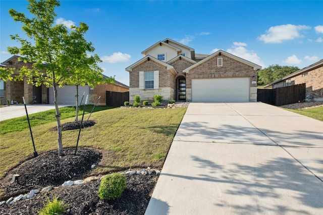 1844 Flying Horseshoe Bnd, Georgetown, TX 78628 - view of front facade with driveway and a garage