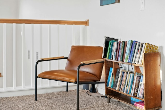 sitting room featuring carpet floors