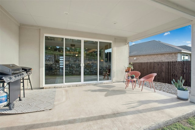 view of patio / terrace with fence and grilling area