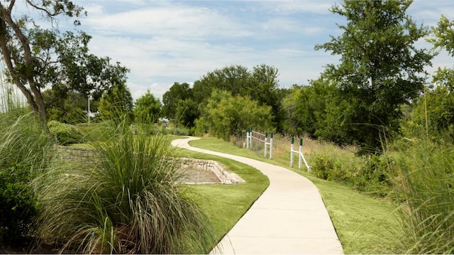 surrounding community with a lawn