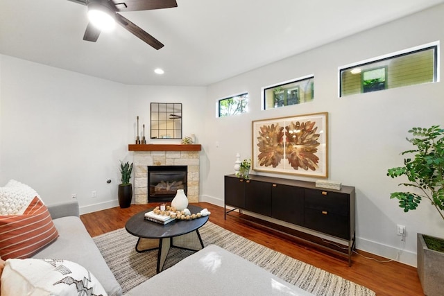 610 Fletcher St Unit A, Austin, TX 78704 - living area featuring ceiling fan, wood finished floors, baseboards, a fireplace, and recessed lighting