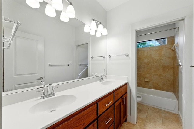610 Fletcher St Unit A, Austin, TX 78704 - bathroom featuring tile patterned floors, double vanity, and toilet