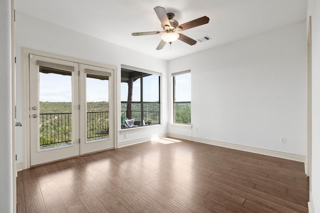 432 Stacey Ann Cv, Dripping Springs, TX 78620 - unfurnished room with wood finished floors and a ceiling fan