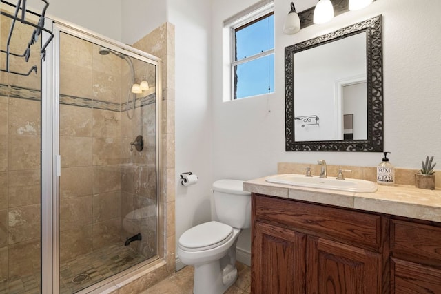 432 Stacey Ann Cv, Dripping Springs, TX 78620 - bathroom with vanity, a stall shower, and tile patterned flooring
