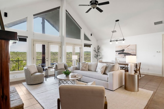 432 Stacey Ann Cv, Dripping Springs, TX 78620 - living room featuring tile patterned flooring, high vaulted ceiling, and a ceiling fan