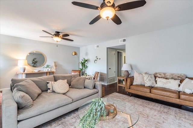 500 E Riverside Dr Unit 264, Austin, TX 78704 - living room with ceiling fan, baseboards, and wood finished floors