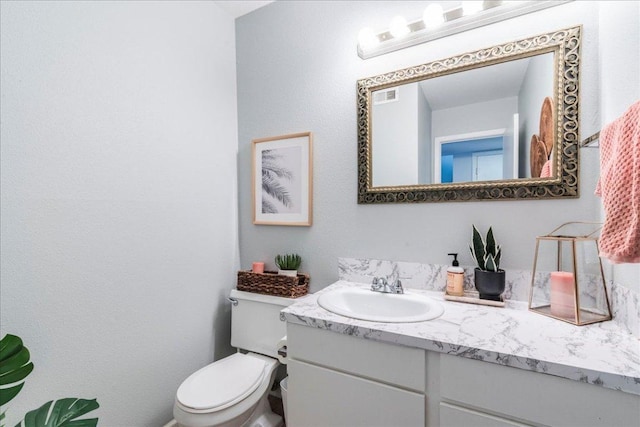 500 E Riverside Dr Unit 264, Austin, TX 78704 - bathroom featuring vanity and toilet