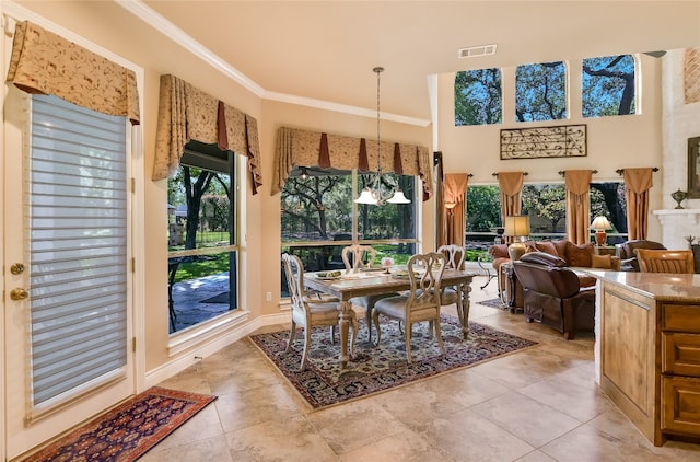 105 Hill Valley Cv, Georgetown, TX 78628 - dining room featuring ornamental molding and light tile patterned flooring