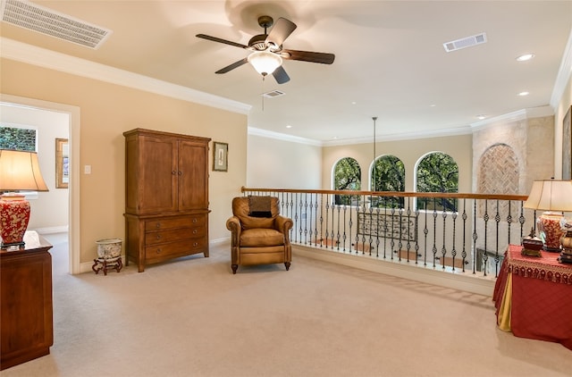 105 Hill Valley Cv, Georgetown, TX 78628 - sitting room with a ceiling fan, light colored carpet, crown molding, baseboards, and recessed lighting