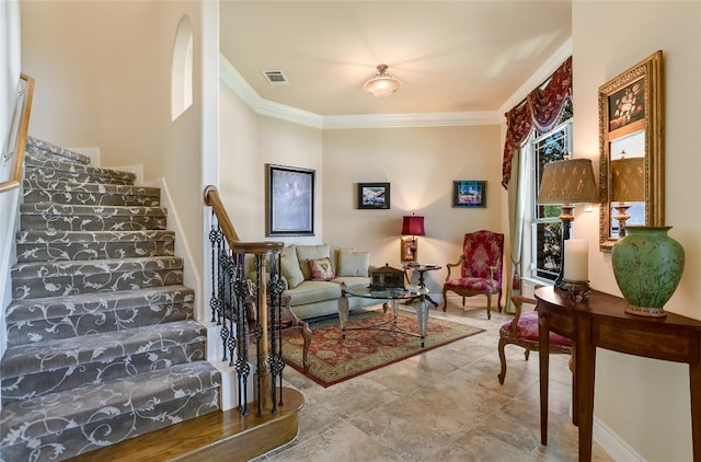 105 Hill Valley Cv, Georgetown, TX 78628 - living area featuring crown molding and stairs