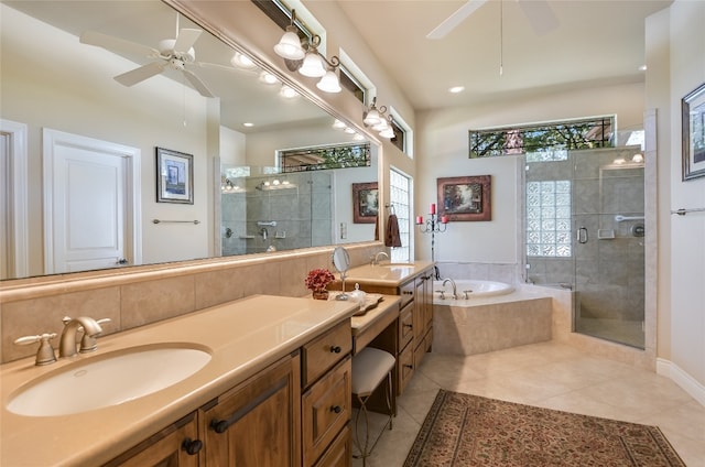 bathroom with a ceiling fan, tile patterned floors, a stall shower, and recessed lighting