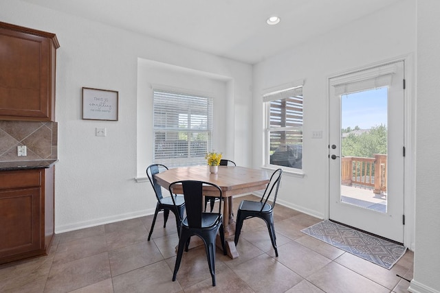 407 Stone View Trl, Austin, TX 78737 - dining area with baseboards, recessed lighting, and light tile patterned floors