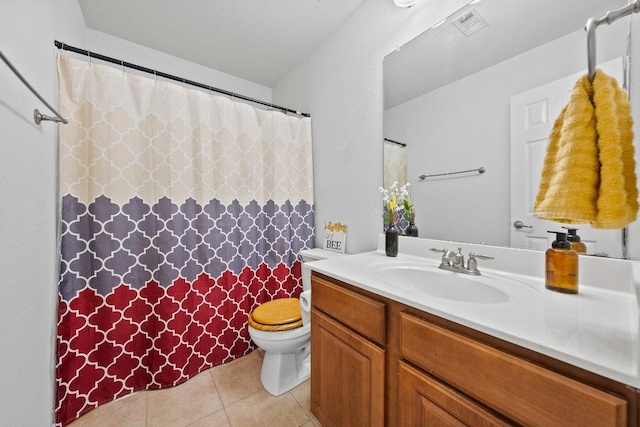 full bathroom with tile patterned floors, toilet, vanity, and a shower with curtain
