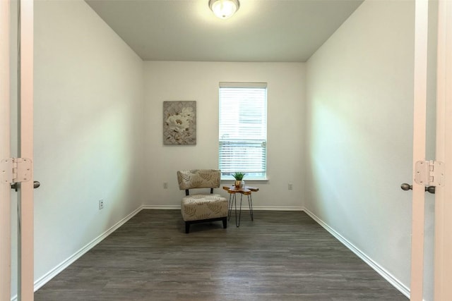 9005 Pin Brush Dr, Austin, TX 78748 - living area featuring dark wood-style floors and baseboards
