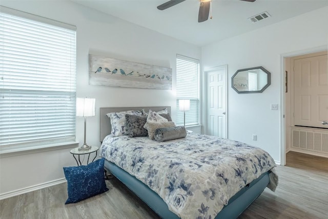 9005 Pin Brush Dr, Austin, TX 78748 - bedroom with wood finished floors, baseboards, and ceiling fan