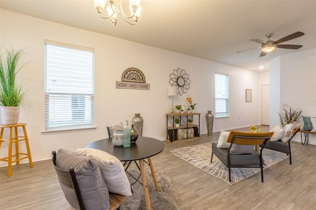 9005 Pin Brush Dr, Austin, TX 78748 - living area with wood finished floors, baseboards, and a chandelier