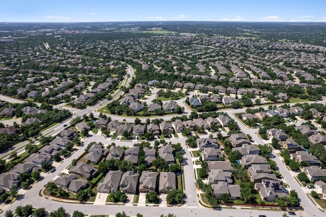 aerial view of property's location featuring nearby suburban area