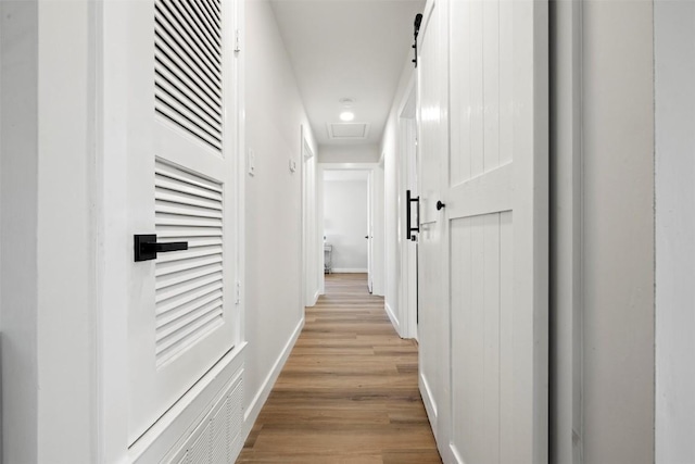 616 Bissonet Ln, Austin, TX 78752 - hallway featuring light wood finished floors and baseboards