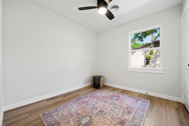 616 Bissonet Ln, Austin, TX 78752 - spare room with a ceiling fan and wood finished floors