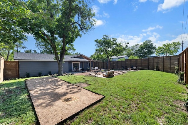 616 Bissonet Ln, Austin, TX 78752 - fenced backyard with a patio area