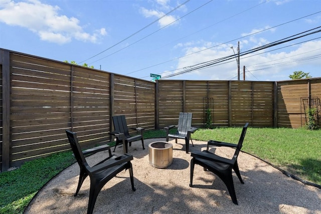 616 Bissonet Ln, Austin, TX 78752 - view of patio featuring an outdoor fire pit