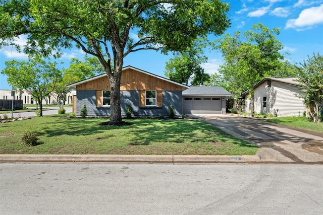 616 Bissonet Ln, Austin, TX 78752 - mid-century home with driveway, an attached garage, a front yard, and brick siding
