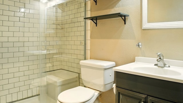 708 Chestnut Xing, Cedar Park, TX 78613 - bathroom with toilet, a stall shower, a textured wall, and vanity