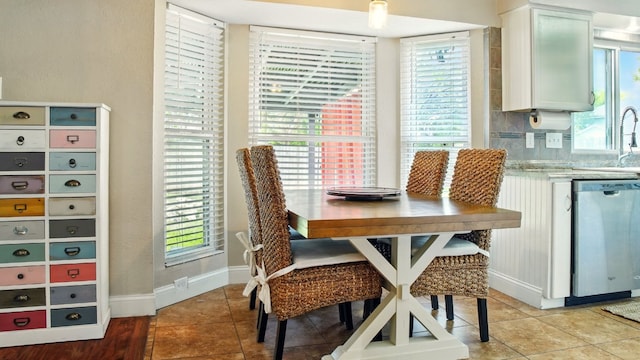 708 Chestnut Xing, Cedar Park, TX 78613 - dining room featuring baseboards, light tile patterned floors, and plenty of natural light