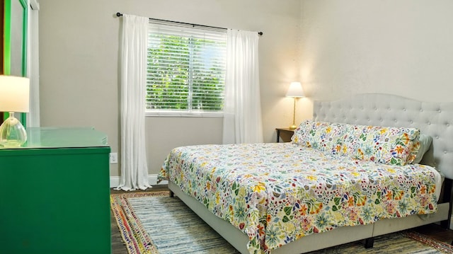 708 Chestnut Xing, Cedar Park, TX 78613 - bedroom with wood finished floors and baseboards