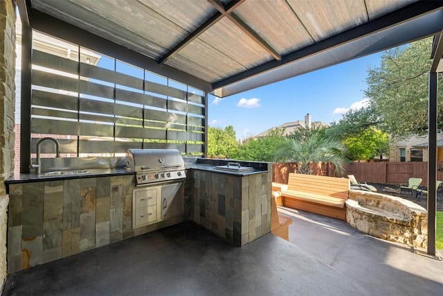 905 S Frontier Ln, Cedar Park, TX 78613 - view of patio with an outdoor fire pit and a sink