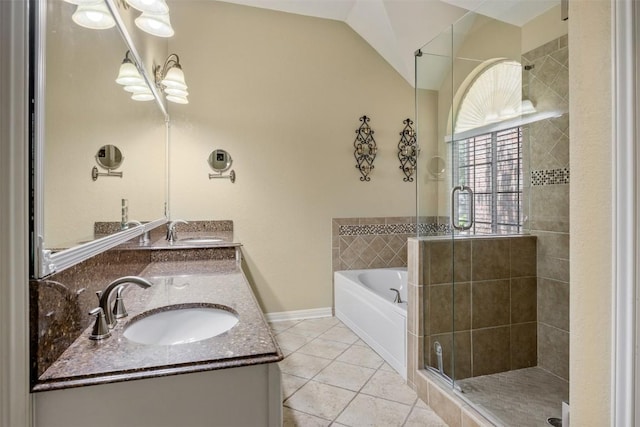 2025 Saint Andrews Dr, Round Rock, TX 78664 - bathroom with tile patterned floors, a bath, a stall shower, double vanity, and vaulted ceiling