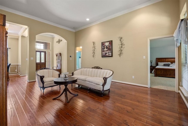2025 Saint Andrews Dr, Round Rock, TX 78664 - living room with arched walkways, wood finished floors, ornamental molding, baseboards, and recessed lighting