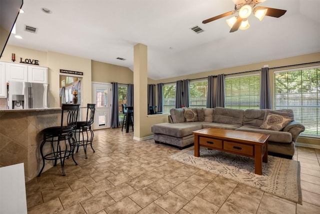 2025 Saint Andrews Dr, Round Rock, TX 78664 - living room featuring vaulted ceiling, a ceiling fan, baseboards, and recessed lighting