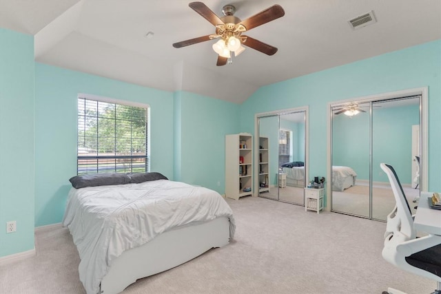 2025 Saint Andrews Dr, Round Rock, TX 78664 - bedroom featuring multiple closets, carpet, ceiling fan, baseboards, and lofted ceiling