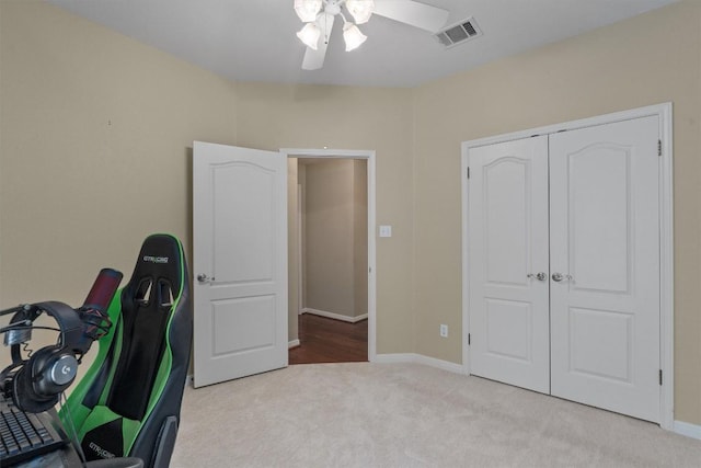 2025 Saint Andrews Dr, Round Rock, TX 78664 - bedroom with carpet floors, baseboards, a closet, and a ceiling fan
