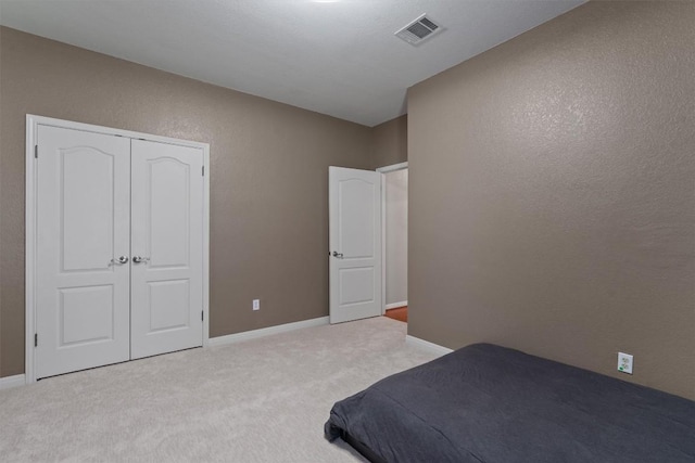 2025 Saint Andrews Dr, Round Rock, TX 78664 - bedroom featuring carpet flooring, a closet, and baseboards