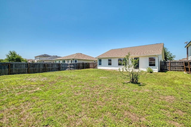 303 Flinn St, Hutto, TX 78634 - rear view of house featuring stucco siding