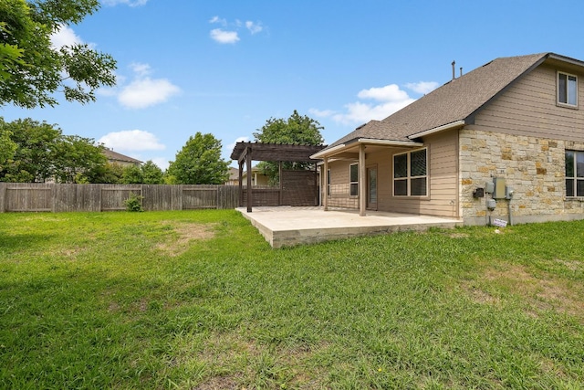view of yard with a pergola and a patio