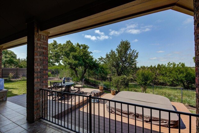 view of patio with outdoor dining area and a fenced backyard