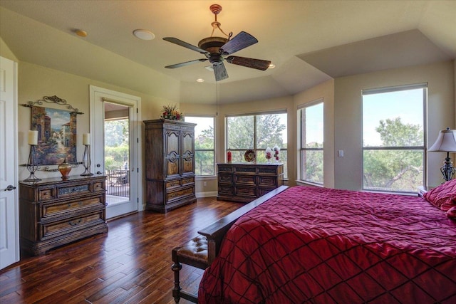 bedroom with access to outside, dark wood-type flooring, ceiling fan, and vaulted ceiling