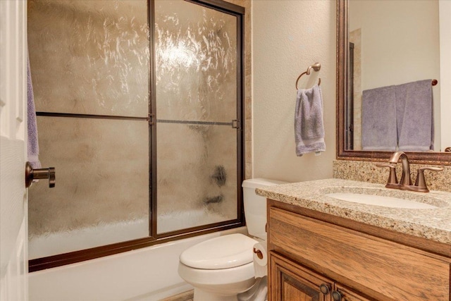 3920 Vail Dv, Bee Cave, TX 78738 - full bath featuring vanity, toilet, and shower / bath combination with glass door