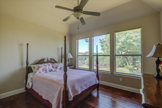 bedroom with multiple windows and baseboards