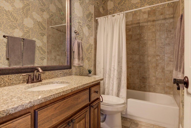 full bath featuring wallpapered walls, toilet, vanity, shower / bath combo with shower curtain, and tile patterned floors
