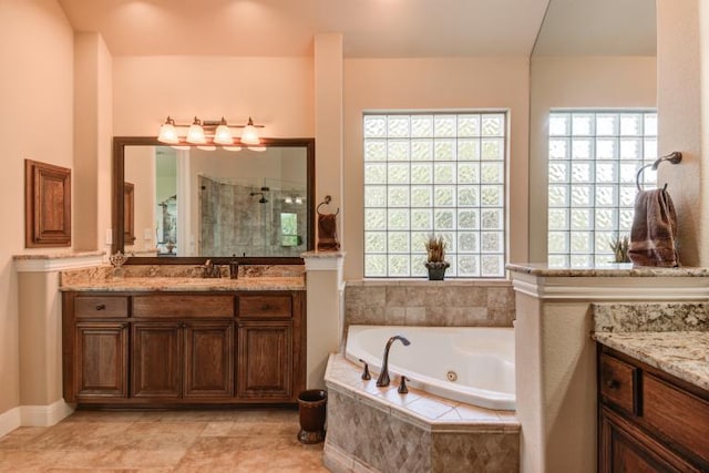 3920 Vail Dv, Bee Cave, TX 78738 - bathroom featuring vanity, a stall shower, and a tub with jets