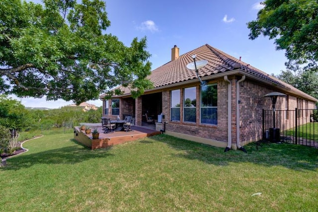 3920 Vail Dv, Bee Cave, TX 78738 - back of house with a chimney, brick siding, a tile roof, and a patio area