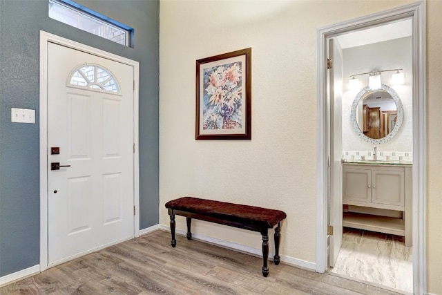 9840 N Live Oak Rd, Salado, TX 76571 - foyer with wood finished floors and baseboards