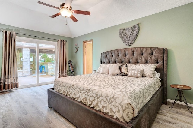 9840 N Live Oak Rd, Salado, TX 76571 - bedroom with access to outside, light wood-type flooring, vaulted ceiling, a ceiling fan, and baseboards